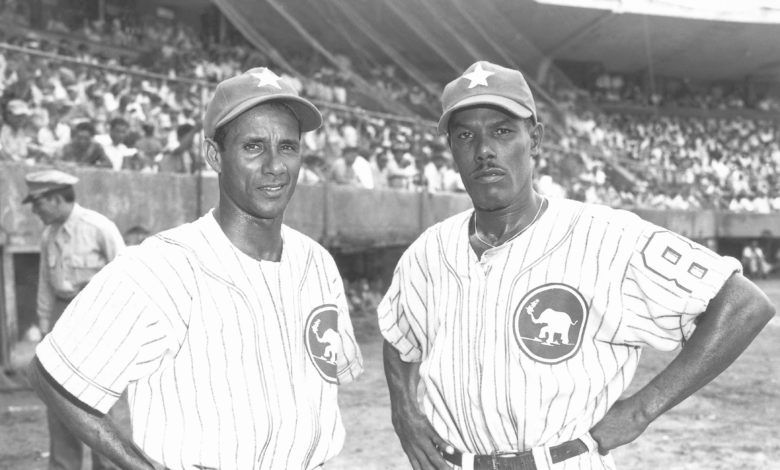 Estrellas Orientales shortstop Papito Vargas and infielder Coco Ferrer of Puerto Rico in 1951.
